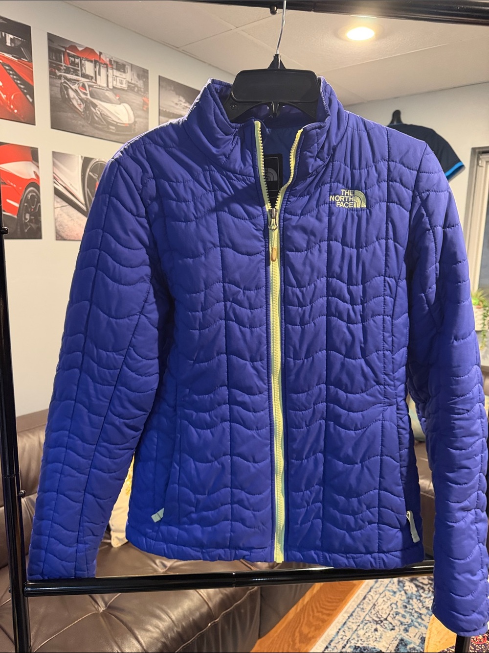 The North Face Women's Quilted Puffer Jacket in Deep Purple with Yellow Zipper
